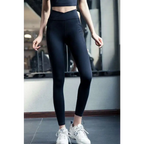 Black high-waisted leggings with sleek design and subtle side pockets in cotton blend for pink yellow yoga set use