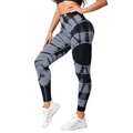 High waist tie dye yoga pants in black and gray tie dye pattern made from stretchy fabric with butt lift design