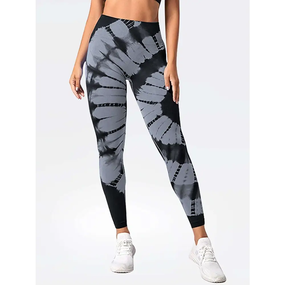 Black and gray high waist tie dye yoga pants with sleek form-fitting design and butt lift effect
