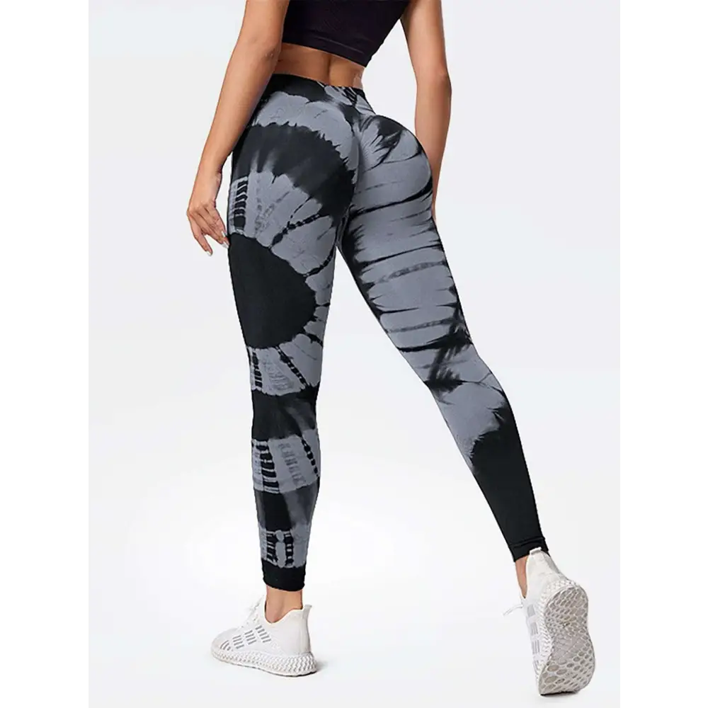 Black and gray high waist tie dye yoga pants with butt lift design made of stretchy fabric for active wear