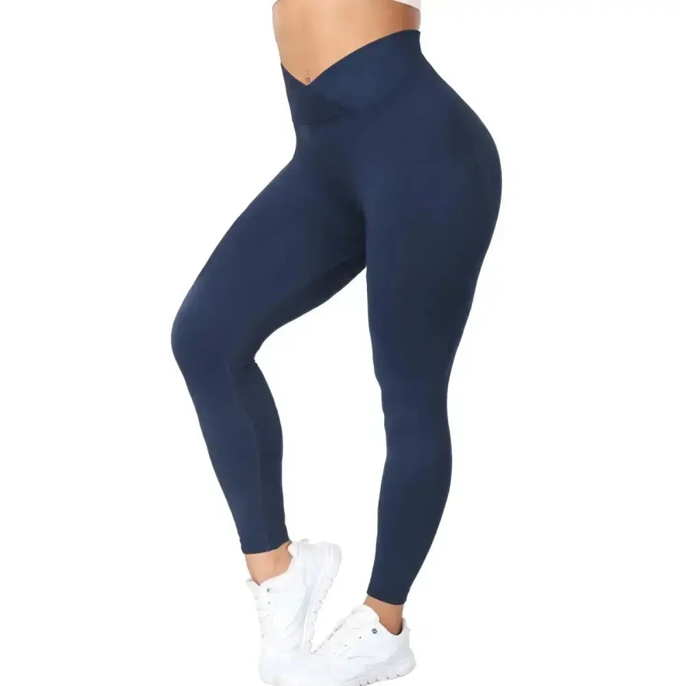 Navy blue high-waisted leggings with tummy control feature a seamless stretchy fabric design displayed in the RoyalEssenceLux titanium steel jewelry and collection highlights page.