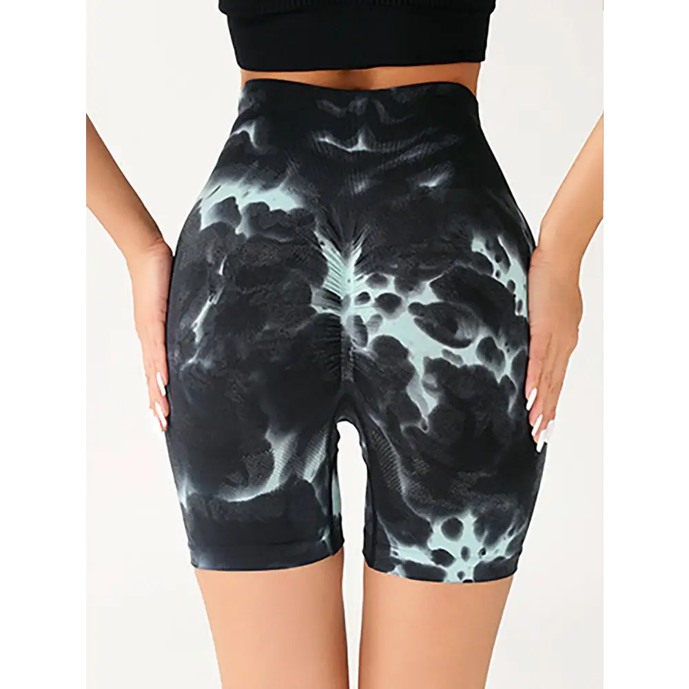 Black and light blue tie-dye high waist tummy control yoga shorts with stretchy, form-fitting design and butt lift effect