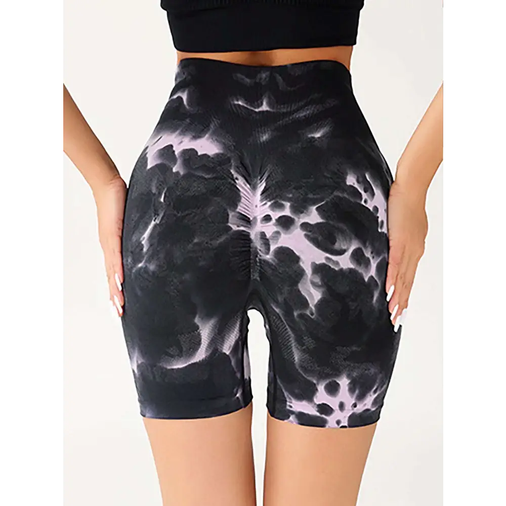 Black and lavender tie-dye high waist tummy control yoga shorts with stretchy form-fitting design and butt lift effect