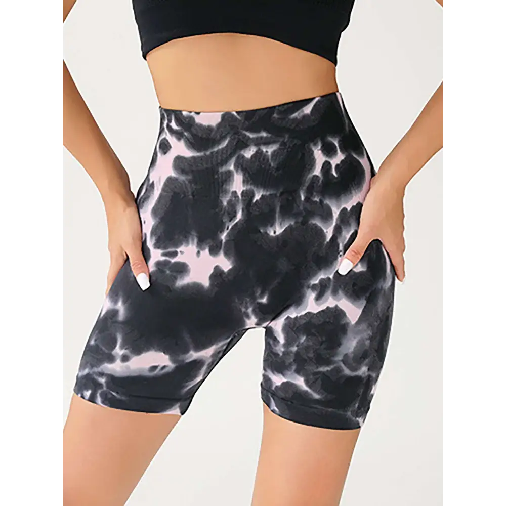 High waist tummy control tie-dye yoga shorts in black and pink featuring butt lift design and stretch fabric for support