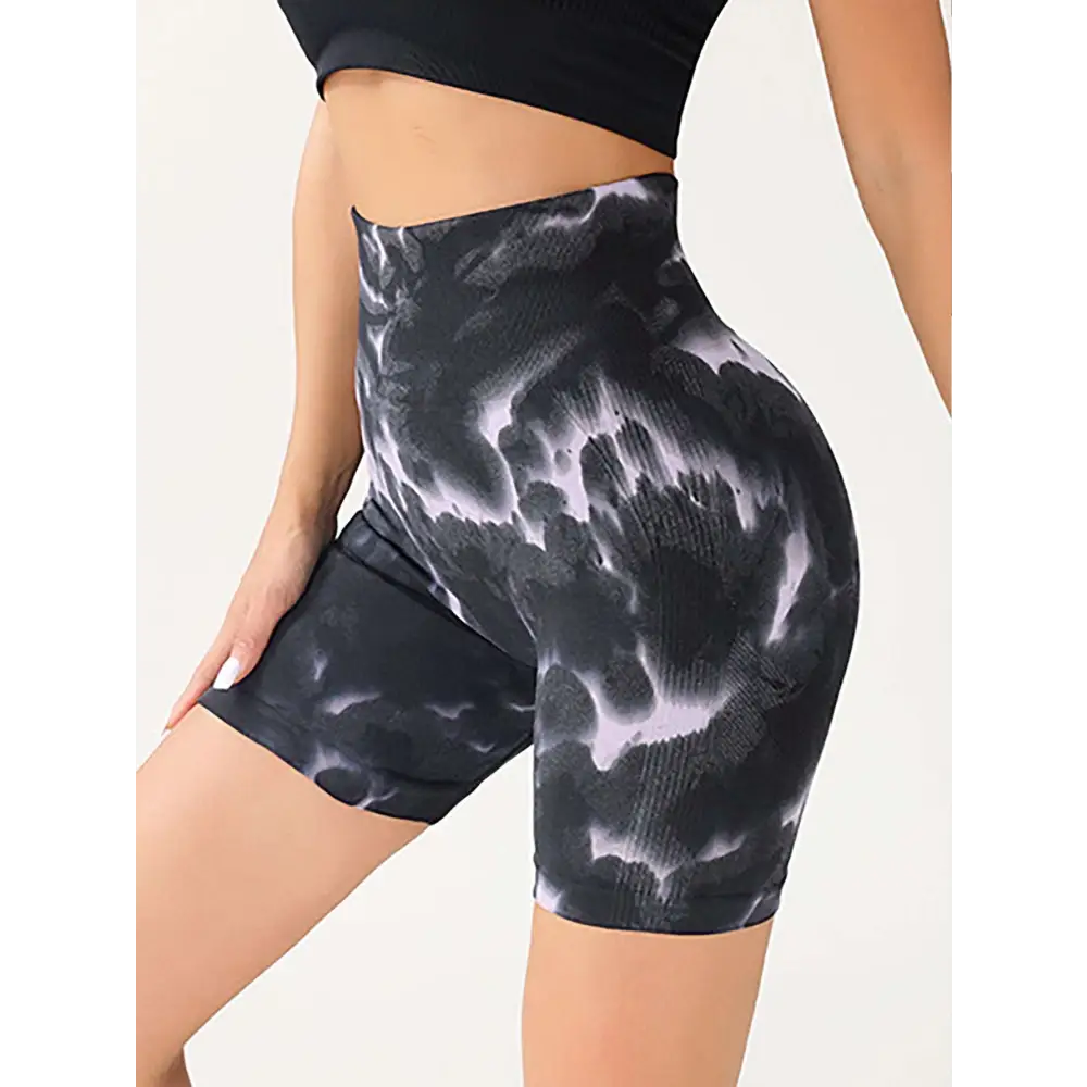 High waist tummy control tie-dye yoga shorts in black and pink featuring butt lift design and stretch fabric for support