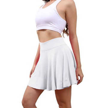 White pleated tennis skirt with high waistband seamless construction and pockets for waisted womens tennis use