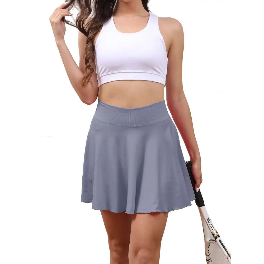 High waisted womens tennis skirt in gray with fitted waistband and lightweight flowing fabric for active use