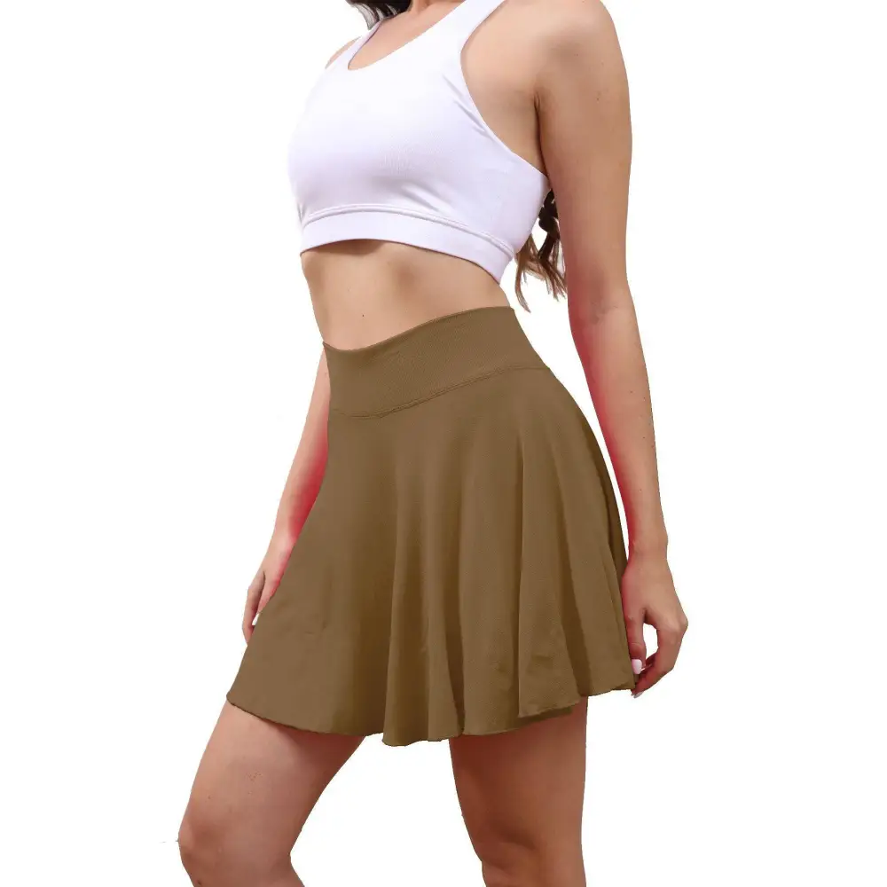 High waisted womens tennis skirt in khaki with pleats and pockets designed for athletic use