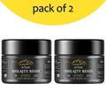 Two black cylindrical jars of biyode shilajit resin ointment with gold mountain graphics for himalayan shilajit use