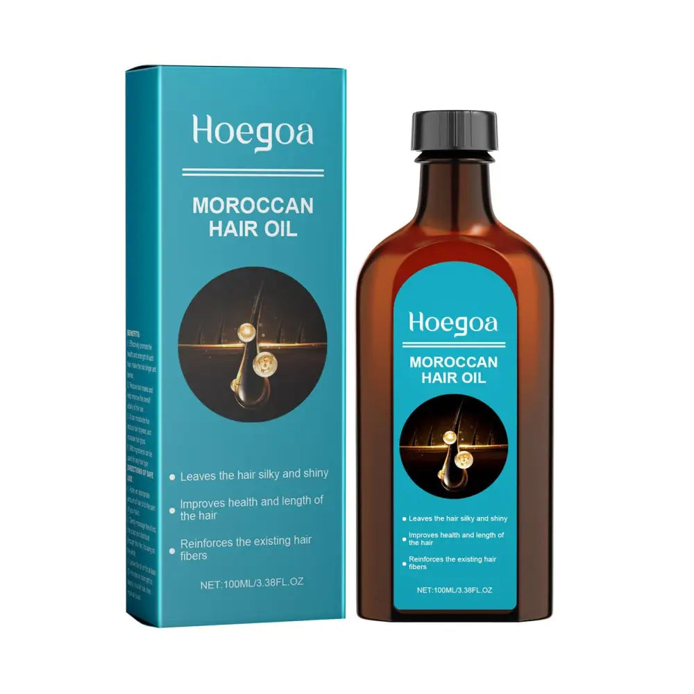 Hoegoa moroccan hair oil in a brown glass bottle with black cap next to teal label packaging for smooth waves care
