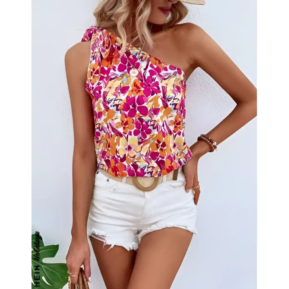 Holidaya allover floral one-shoulder blouse with a floral print knot design in pink orange and yellow on white background