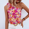 Holidaya allover floral one-shoulder blouse with a vibrant pink orange yellow floral print knot on white base