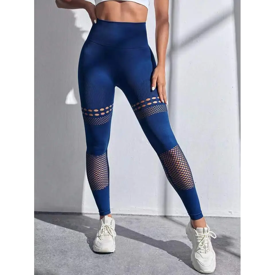 Deep blue high-waisted hollow seamless yoga pants with mesh panels on thighs and lower legs for training