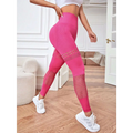 Bright pink high-waisted hollow seamless yoga pants with mesh panels on thighs and calves for training