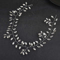 Silver leafy horse eye silver flexible chain wedding hair accessory adorned with clear faceted crystals