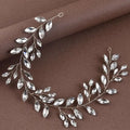 Silver leaf-shaped horse eye silver flexible chain wedding hair accessory adorned with clear faceted crystals