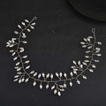 Silver leaf-shaped horse eye silver flexible chain wedding hair accessory adorned with clear faceted crystals