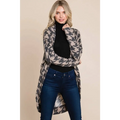 A long beige houndstooth open front cocoon knit cardigan featuring a classic bombom houndstooth pattern