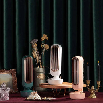 Three stylish compact humidification tower fans in teal white and blush pink with rose gold accents for personal air cooling