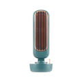 Teal humidification tower fan with rose gold grille offers personal air cooling and spray fan functions for desktop use