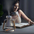 White and transparent glass aroma diffuser humidifier usb wireless with wooden handles and sleek modern design