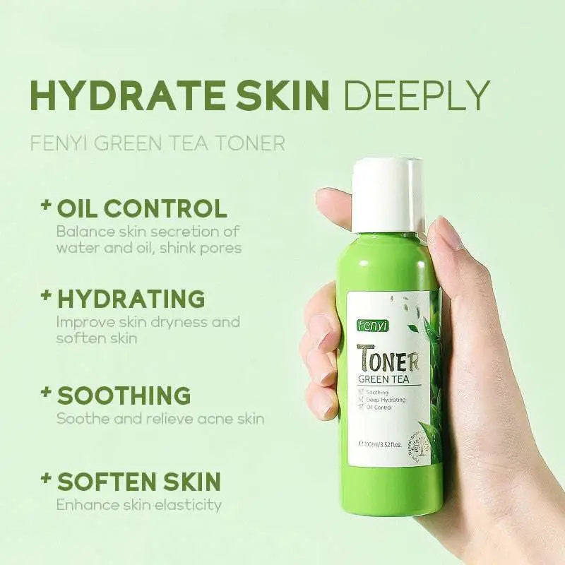 A vibrant green fenyi hydrating green tea toner 100ml bottle with white cap and label held in hand for skin care