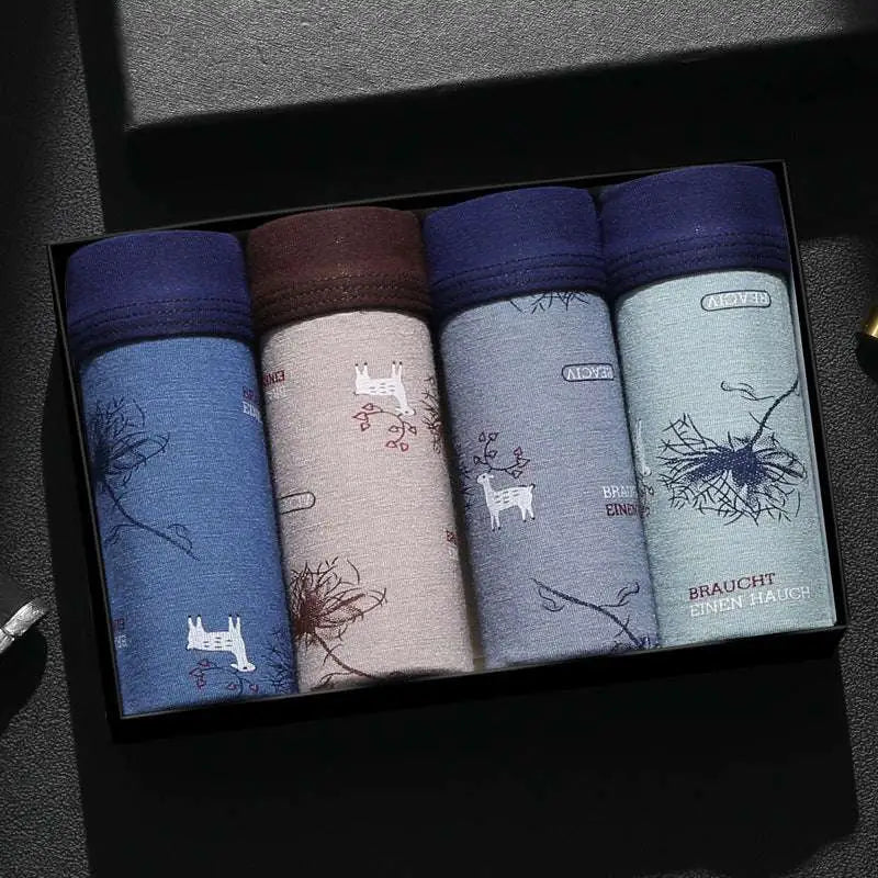Set of four ice silk modal men’s boxer briefs in soft cotton with nature-themed prints and contrasting waistbands