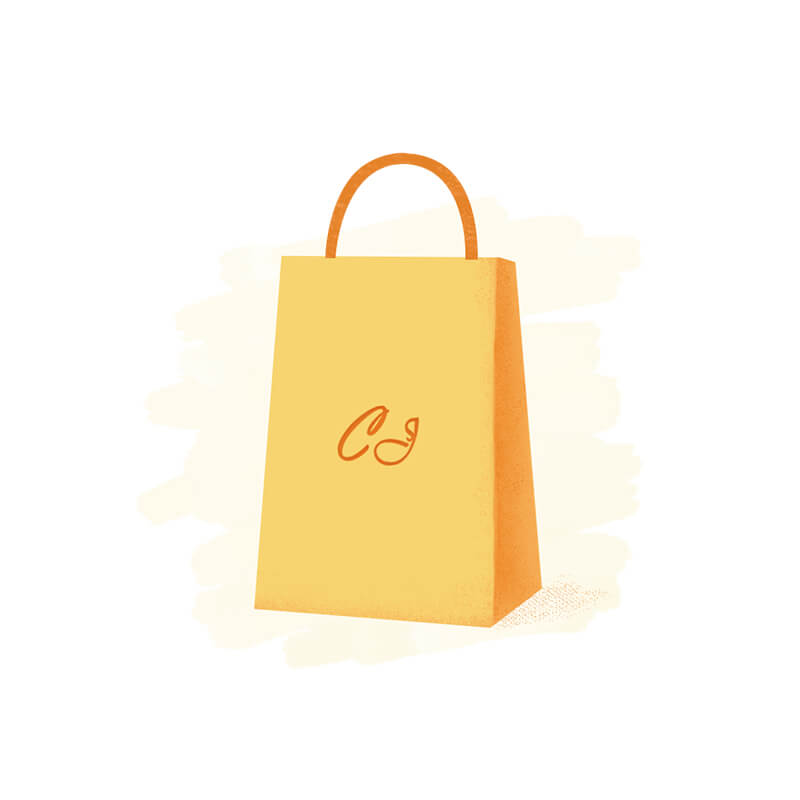 A soft yellow paper shopping bag with an orange handle and an elegant cursive logo, presented alongside a bridal deep v-neck long sleeve wedding dress.