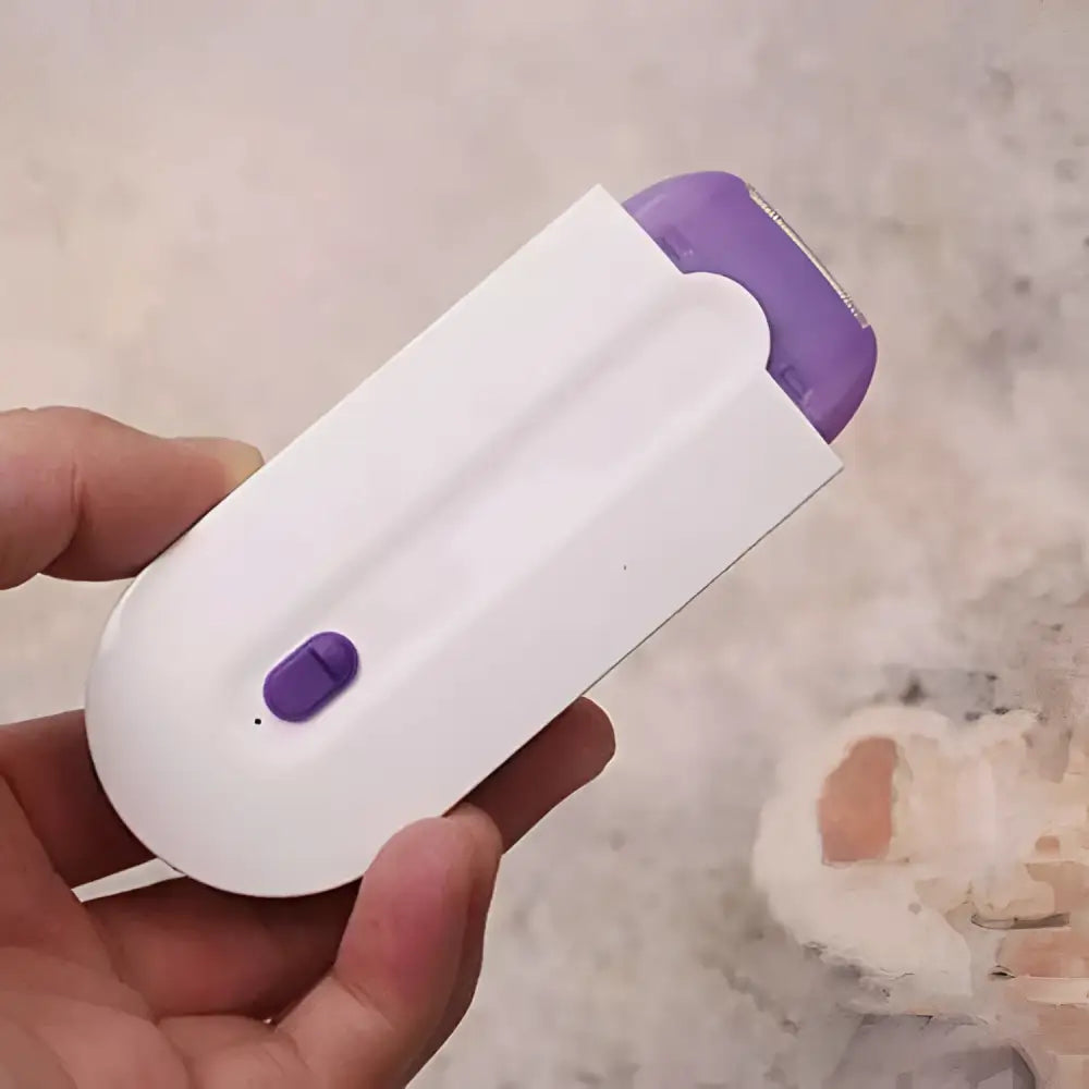 White and purple induction type lady hair removal device with sleek ergonomic design for precise hair removal