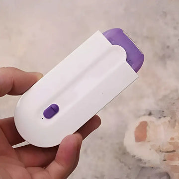 White and purple induction type lady hair removal device with sleek ergonomic design for precise hair removal