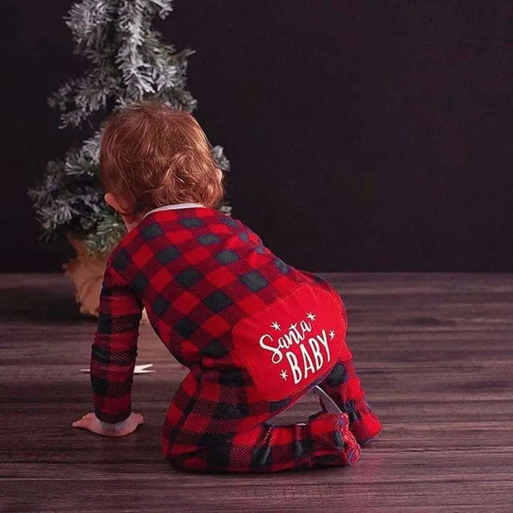 Back view of red and black plaid santa plaid romper with santa baby embroidered in white for boys girls christmas use