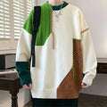 A chunky cream-colored ins colorblock pullover sweater with vibrant green and brown cable-knit details for winter fashion knitted wear