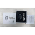 Black oval-shaped intelligent relieve anxiety pulse stimulation device with three buttons in foam inside white box for anxiety sleep instrument
