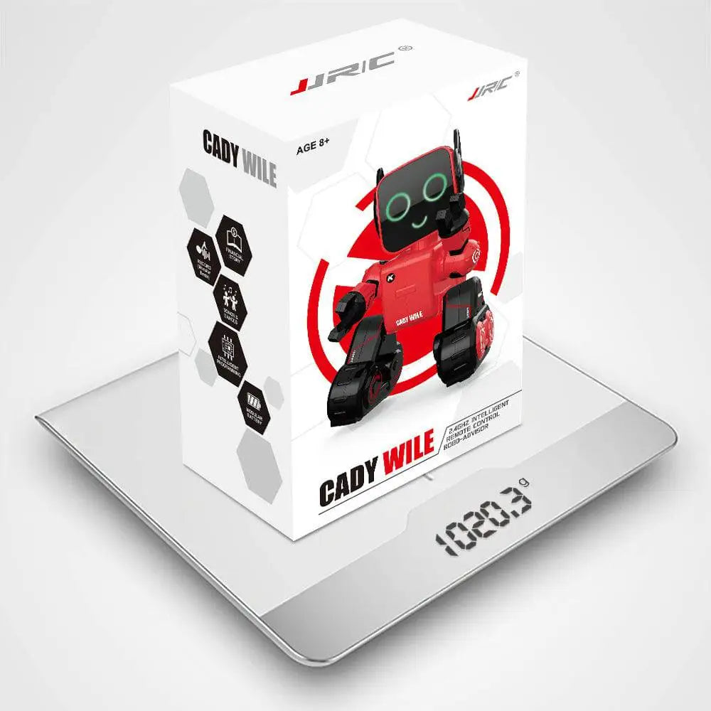 Red and black cady wile intelligent remote control robot with tank wheels and glowing teal eyes on a digital scale
