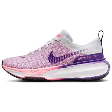 Pink and purple nike invincible 3 womens road running shoes with knit upper and cushioned sole in white coral chalk