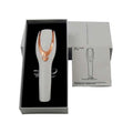 Iridescent hair care phototherapy LED comb in white and rose gold with sleek ergonomic design for hair care phototherapy