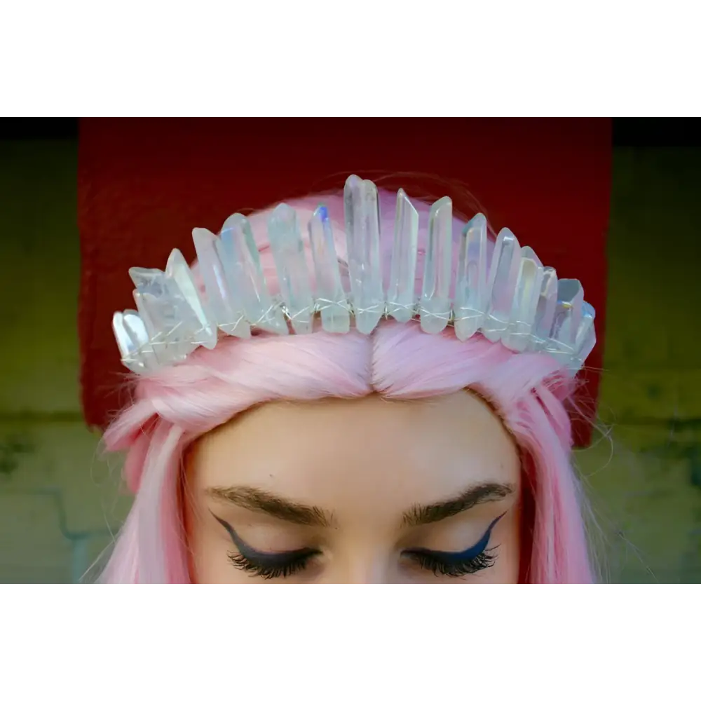 A delicate iridescent quartz crown tiara with pointed facets and silver wire frame bridal hair accessories