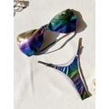 Iridescent rainbow bikini featuring a shimmering gradient swimsuit in blue purple and green hues for beachwear