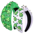 Irish green shamrock rhinestone knotted headband in green and white with three-leaf clover appliqués and sparkling rhinestones