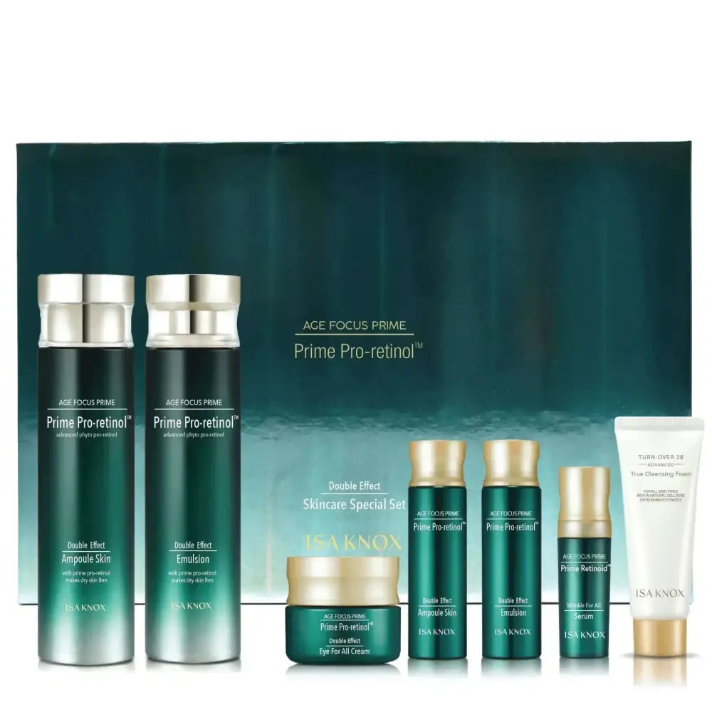 Isa knox focus prime double effect skincare set with sleek green and gold bottles featuring silver caps on dark teal background
