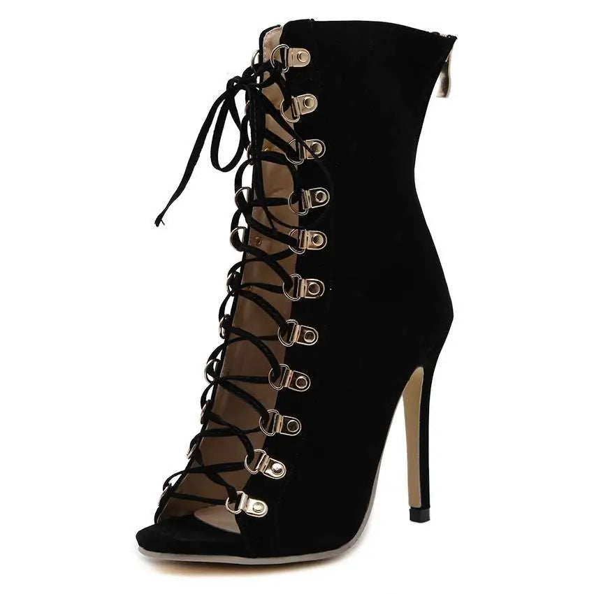 Black suede italian early autumn lace-up ankle boot with gold-tone eyelets and high stiletto heel