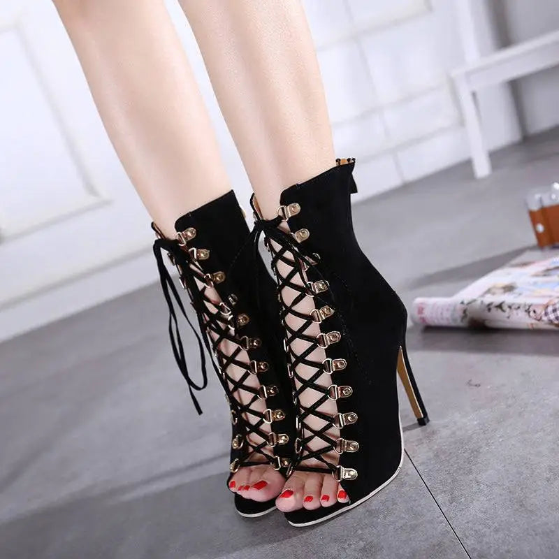 Black suede italian early autumn lace-up peep toe ankle boots with gold-tone autumn strap rivet and stiletto heel