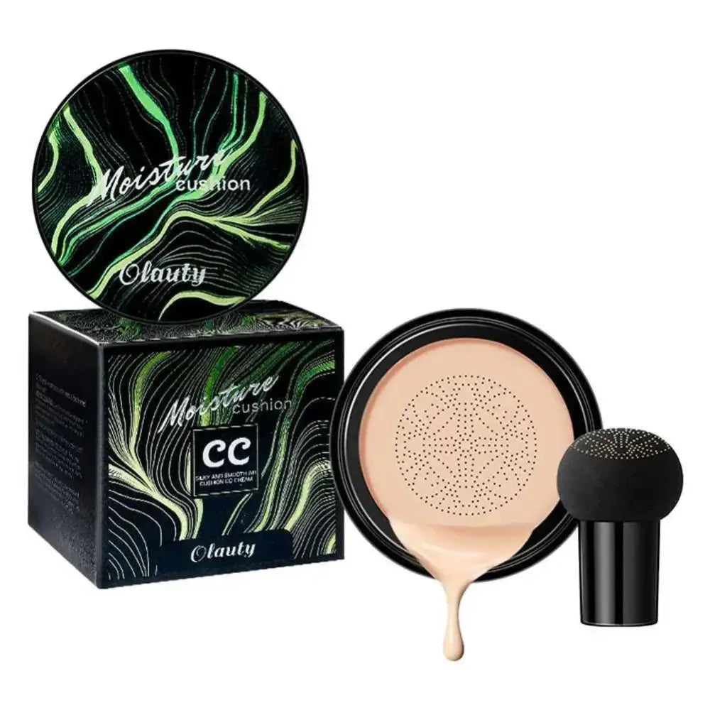 Ivory marbled air cushion foundation with black and green compact and textured sponge for cream foundation application