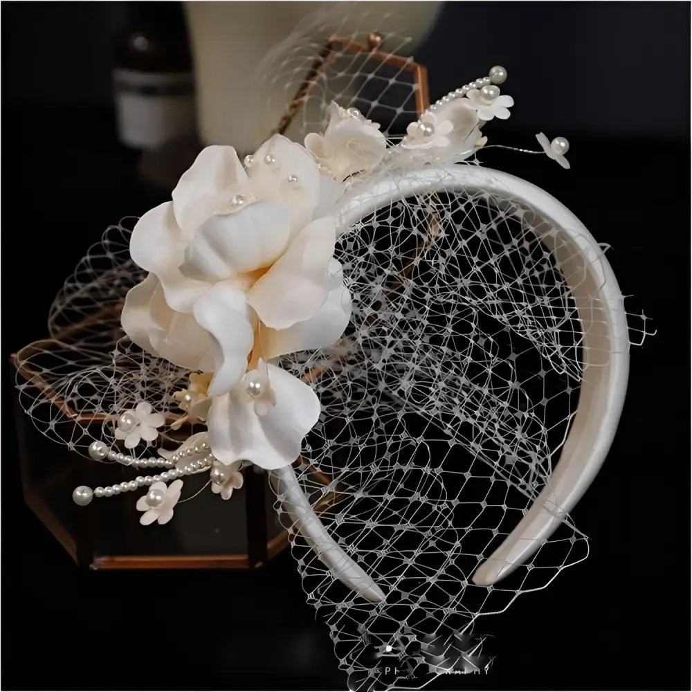 Elegant ivory petal mesh hairband featuring delicate lace pearls and tiny white floral blossoms for formal wear