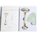 The jade roller in the gua sha gift set features smooth pale green stone rollers with gold-toned metal accents