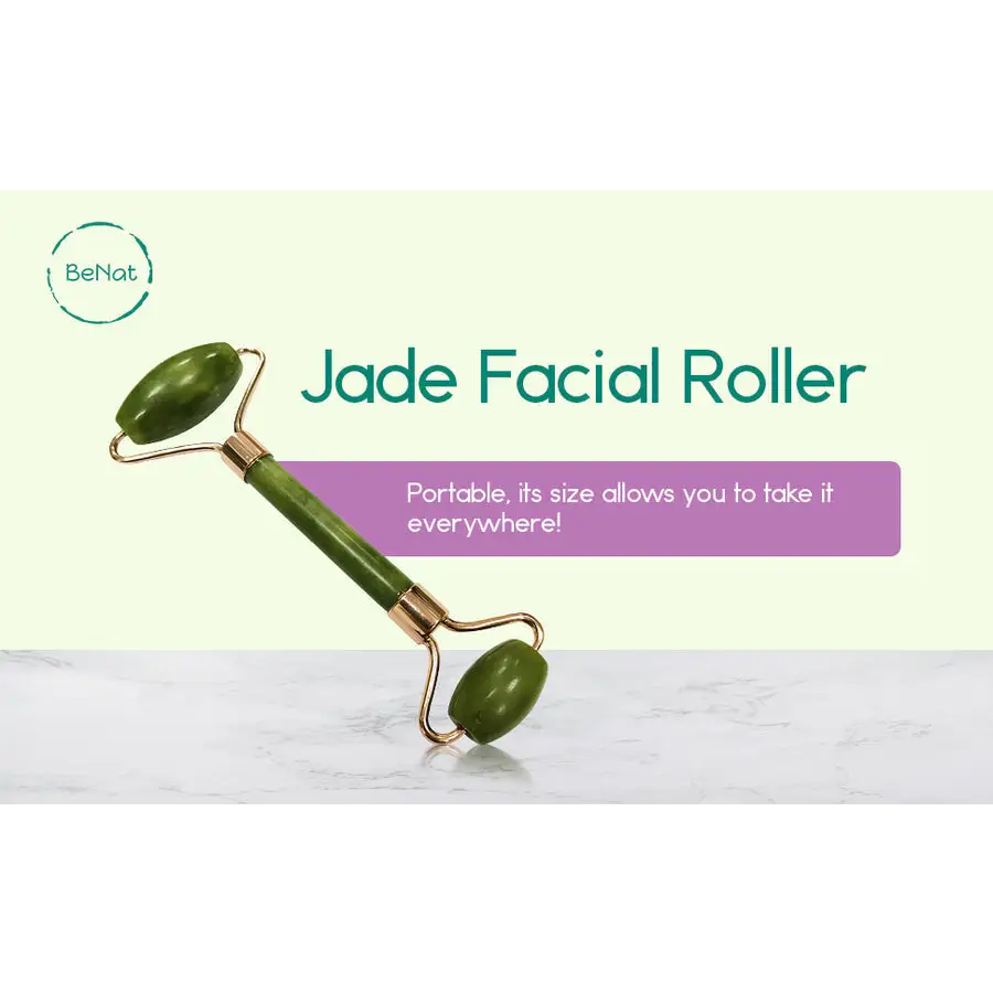 Green jade facial roller with gold toned handles in a sleek design for jade rolling in a gua sha gift set