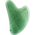 A smooth translucent green jade gua sha gift tool with a heart-shaped design for jade rolling and facial massage