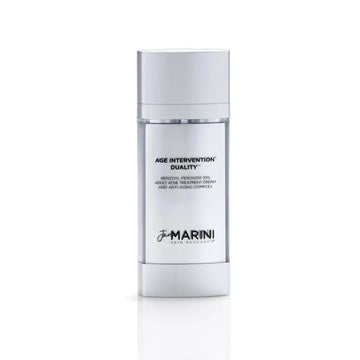 A sleek silver-topped glass bottle of jan marini age intervention duality adult acne treatment cream for marini skin research
