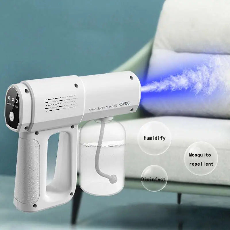 K5 pro electric sanitizer sprayer white handheld nano disinfection gun with transparent reservoir and blue mist output