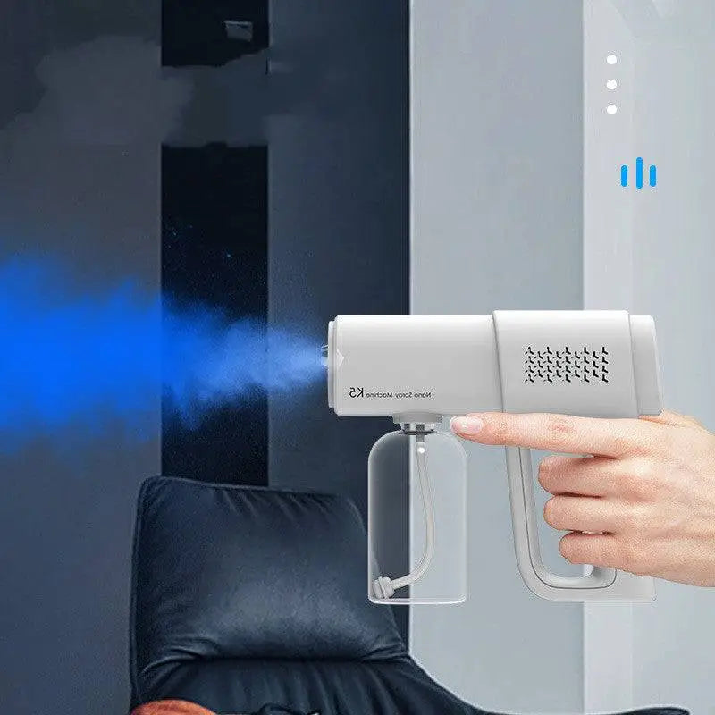 White handheld k5 pro electric sanitizer sprayer nano disinfection gun with transparent liquid reservoir and patterned vent grille